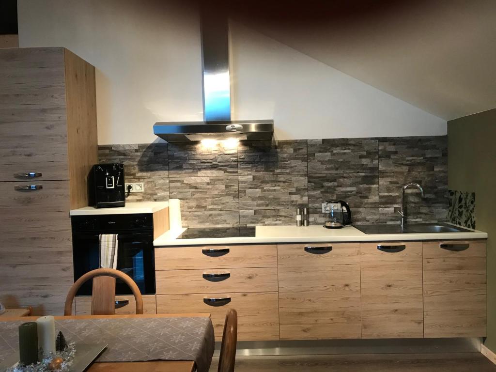 Kuchyň nebo kuchyňský kout v ubytování Alpenlodge Kirchbach