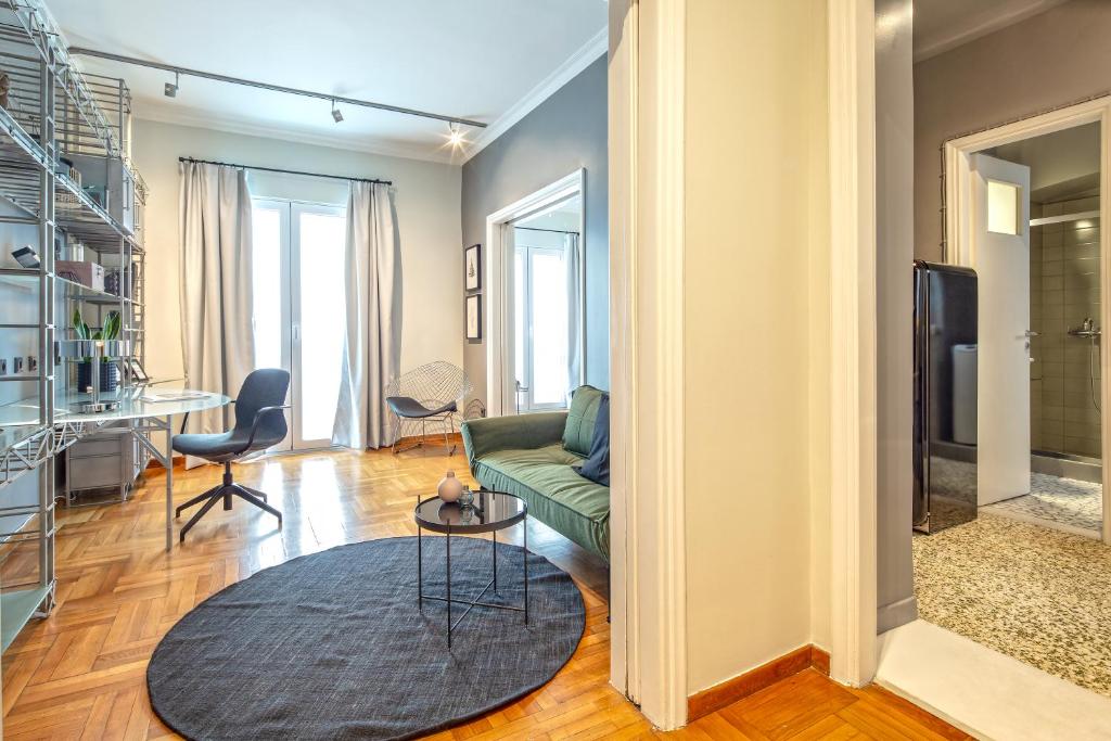 Posezení v ubytování Superb 1BD Apartment in the heart of Kolonaki by UPSTREET