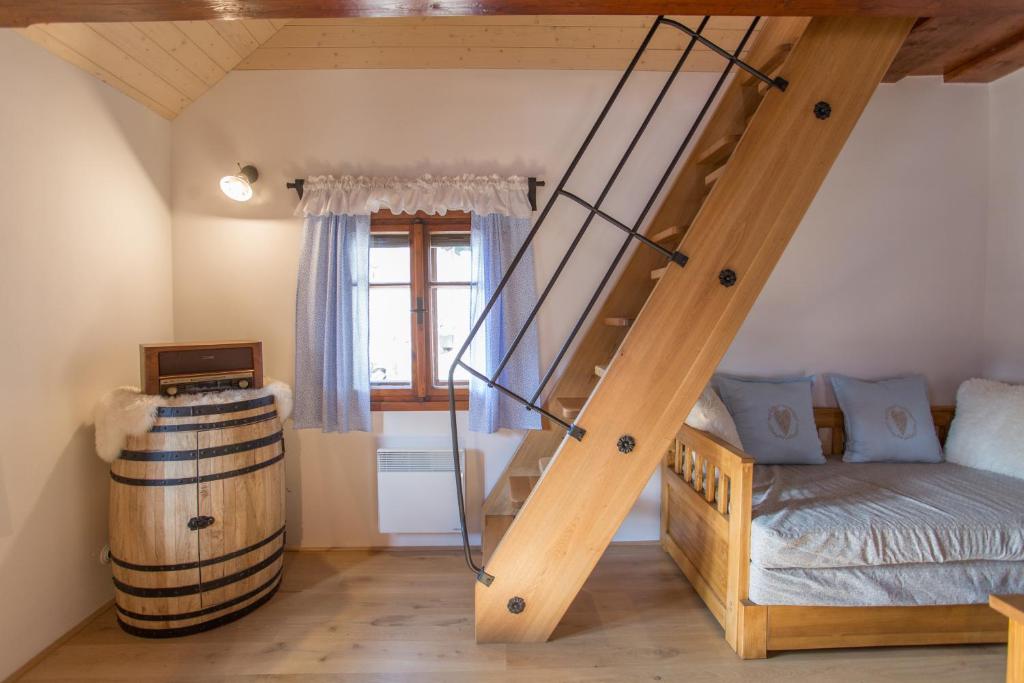 Postel nebo postele na pokoji v ubytování Orlí Hnízdo