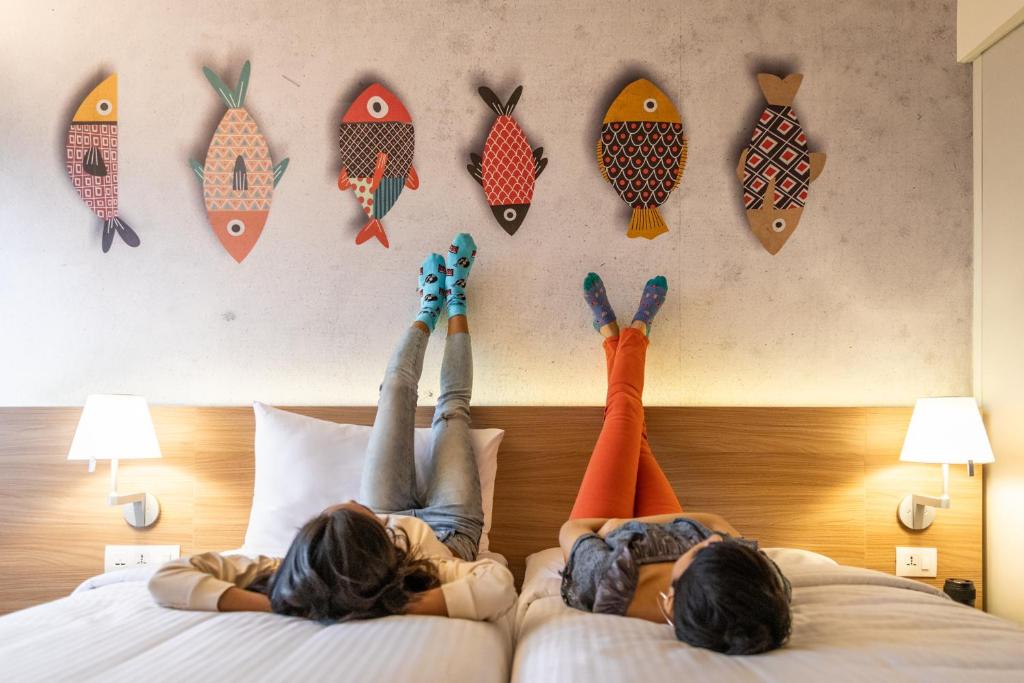 Postel nebo postele na pokoji v ubytování ibis Kolkata Rajarhat - An Accor Brand