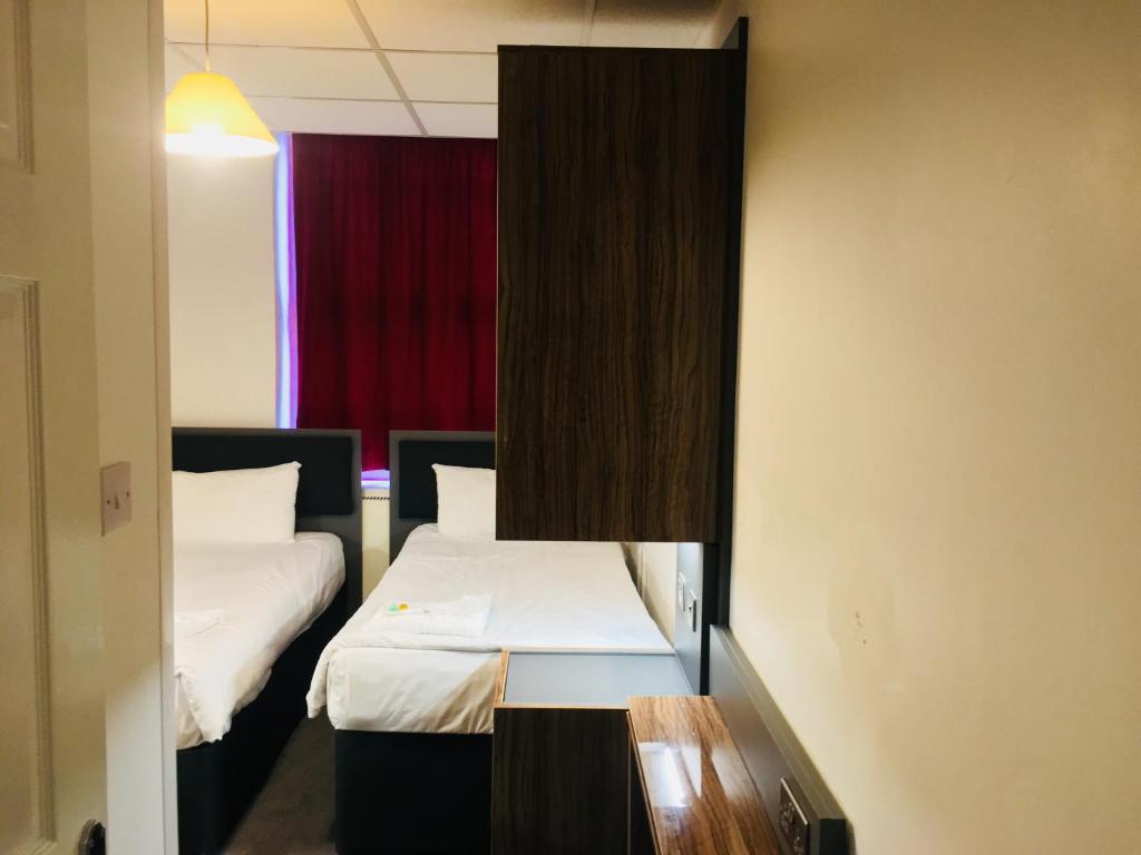 Postel nebo postele na pokoji v ubytování Hotel Express Newcastle Gateshead