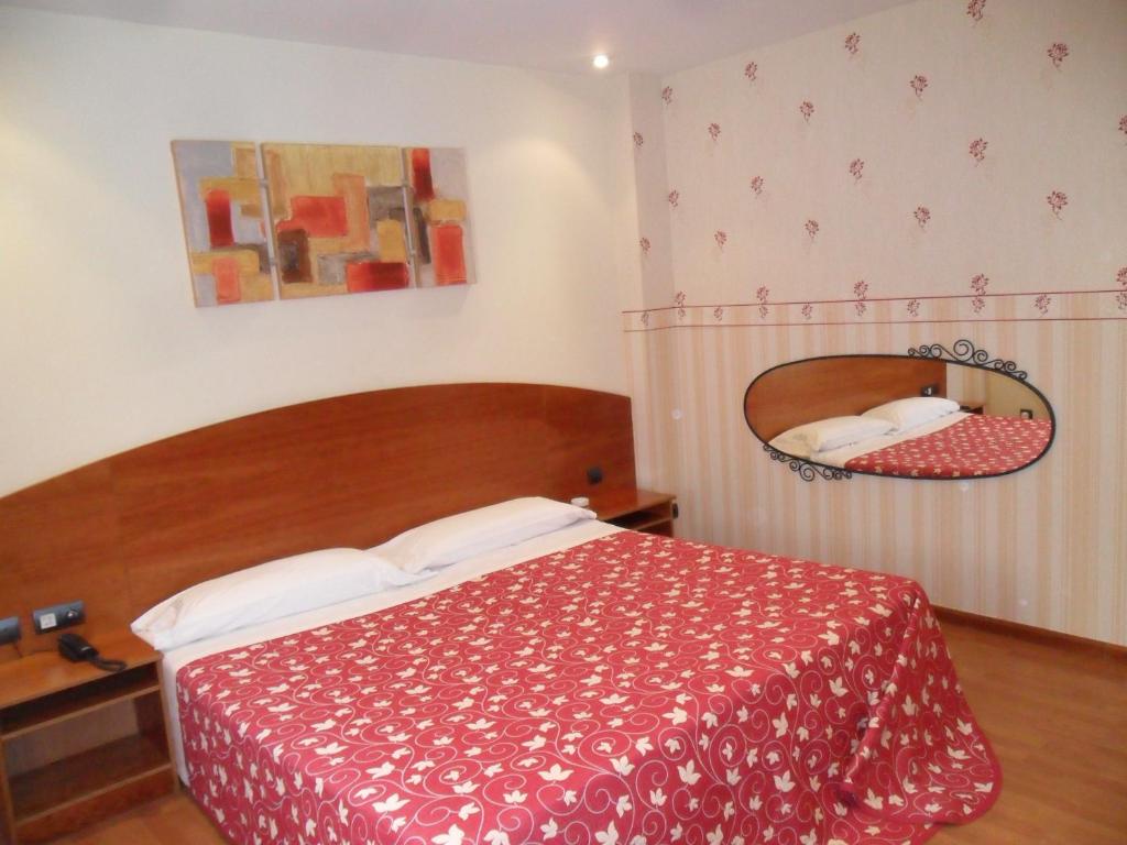 Posteľ alebo postele v izbe v ubytovaní Motel Emporio