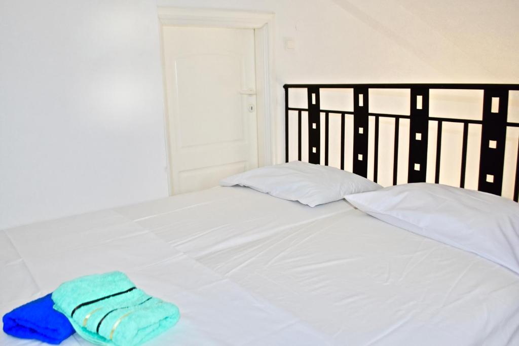 Postel nebo postele na pokoji v ubytování DISTRiCT 01 -Luxurious Villa with private beach