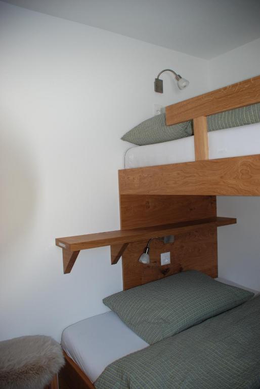 Postel nebo postele na pokoji v ubytování Chalet Foresta