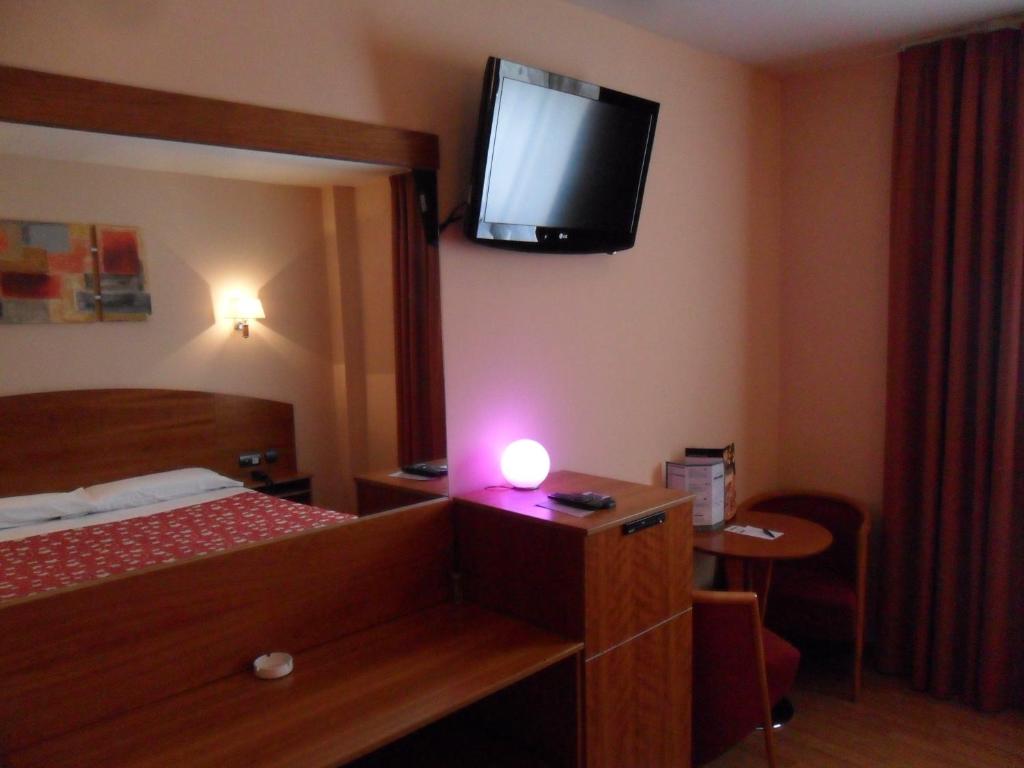 Posteľ alebo postele v izbe v ubytovaní Motel Emporio