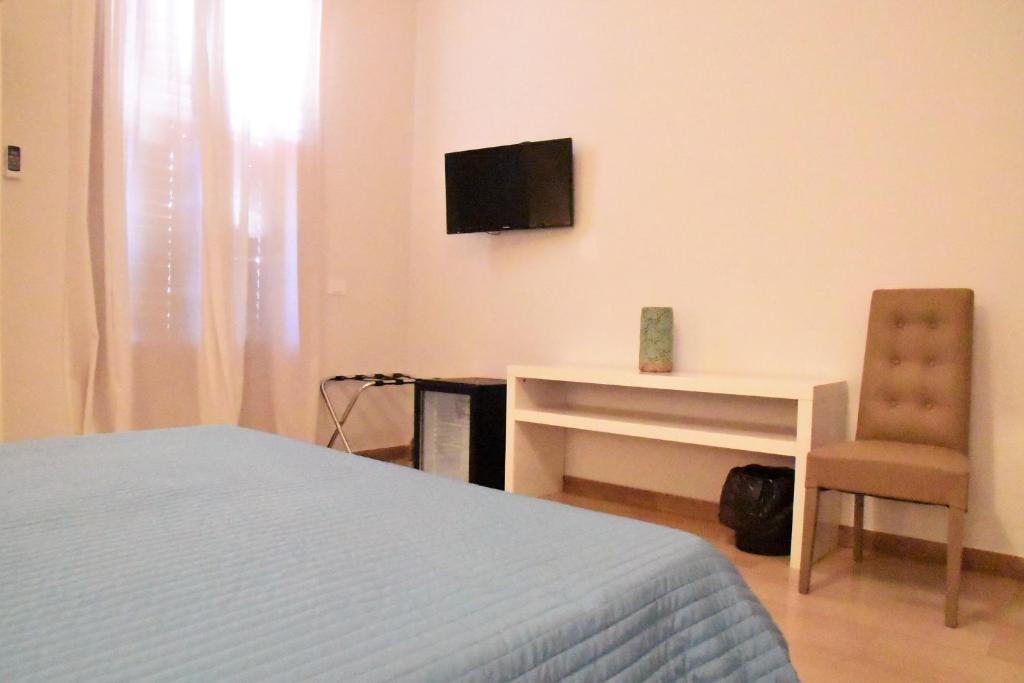 TV a/nebo společenská místnost v ubytování Simonetta's Rooms