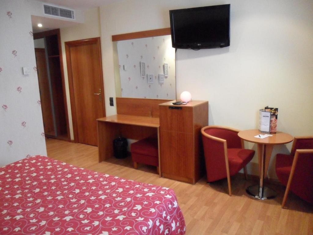Posteľ alebo postele v izbe v ubytovaní Motel Emporio