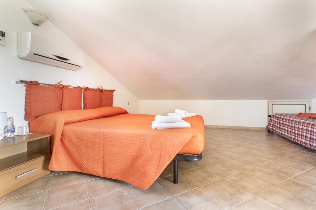 Posteľ alebo postele v izbe v ubytovaní Case Vacanze Paradise Beach Vicino Cefalù PISCINA APERTA