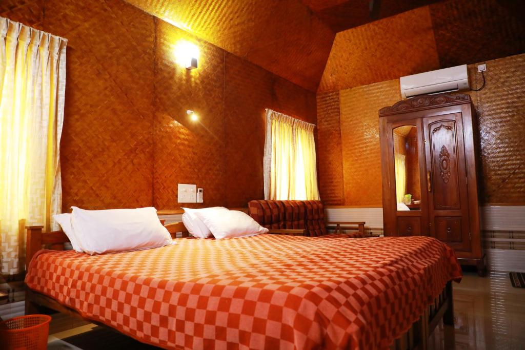 Postel nebo postele na pokoji v ubytování Cherai Beach Residency
