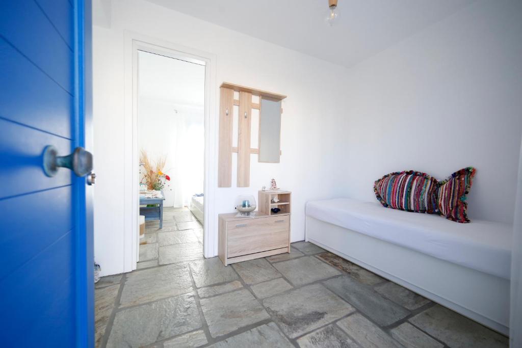 Postel nebo postele na pokoji v ubytování Serenity Kythnos