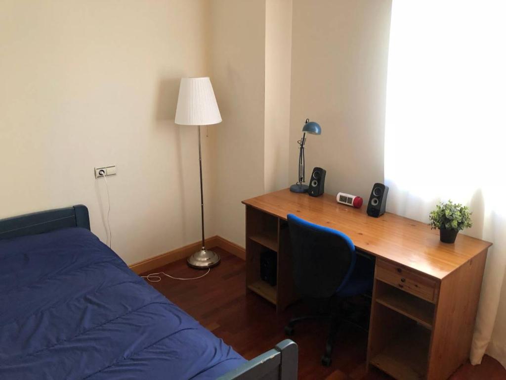 Postel nebo postele na pokoji v ubytování Villa de Madrid 17