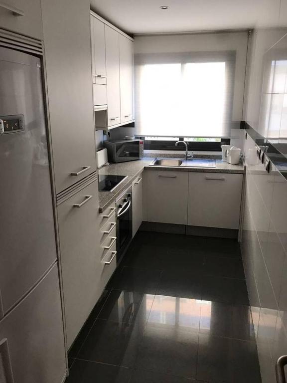 Kuchyň nebo kuchyňský kout v ubytování Villa de Madrid 17