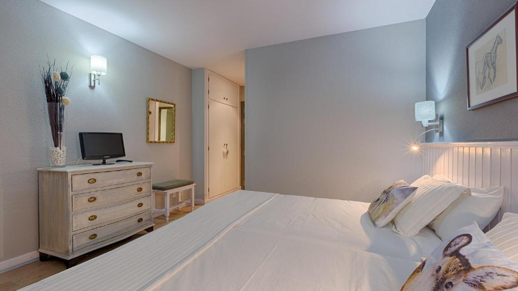 TV a/nebo společenská místnost v ubytování Hotel Ribaeta
