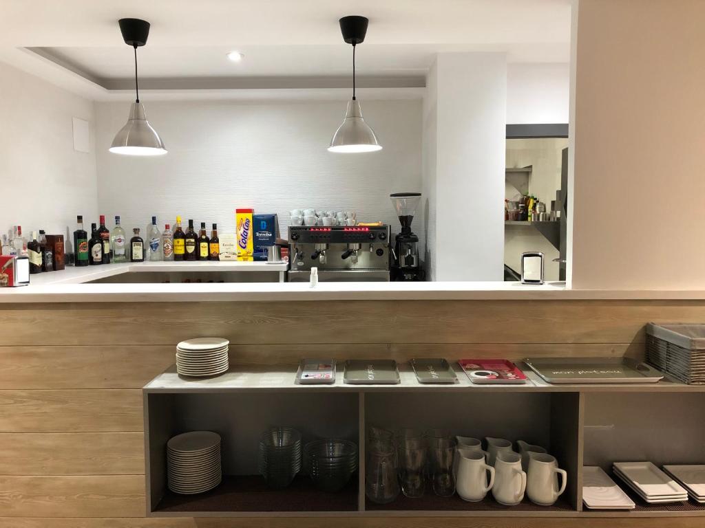 Kuchyň nebo kuchyňský kout v ubytování Hotel Ribaeta