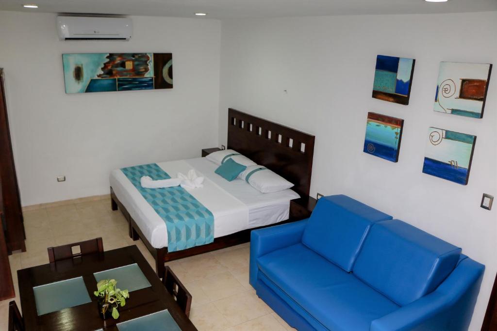 Postel nebo postele na pokoji v ubytování Playa Linda Hotel