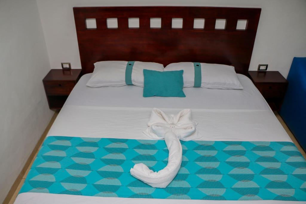 Postel nebo postele na pokoji v ubytování Playa Linda Hotel