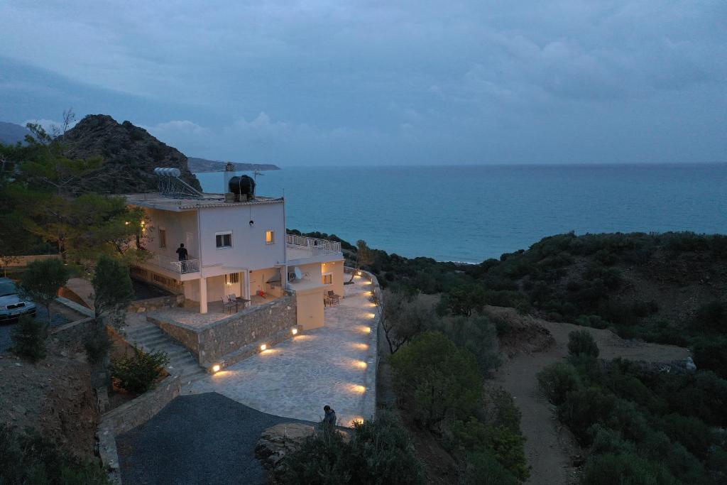 an aerial view of a house with lights on it at Skouros Villa in Kastrí