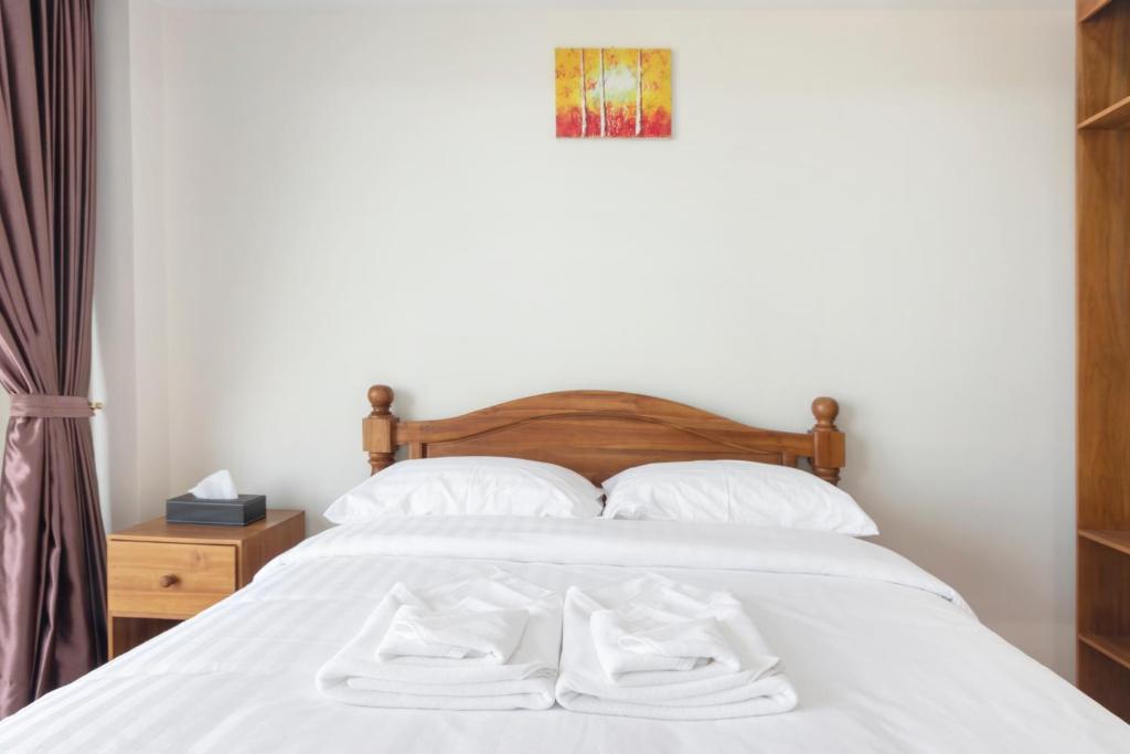 Postel nebo postele na pokoji v ubytování Royale 8 Ville Guest House