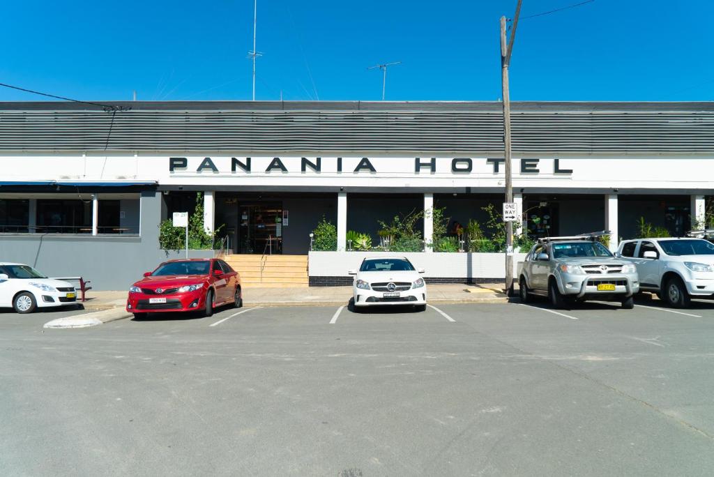 a parking lot in front of a panama hotel at Panania Hotel Sydney in Panania