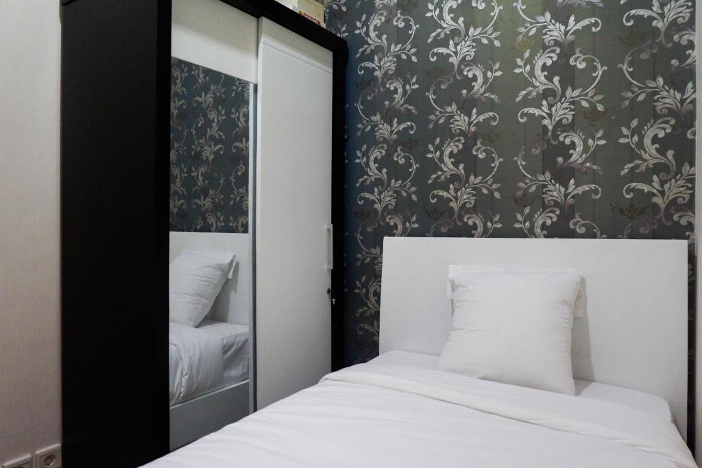 Strategic 2BR Apartment at Trillium Residence By Travelio - Appartement