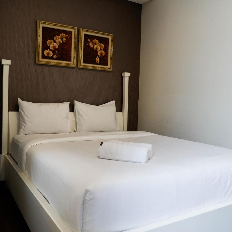 Strategic 2BR Apartment at Trillium Residence By Travelio - Housity