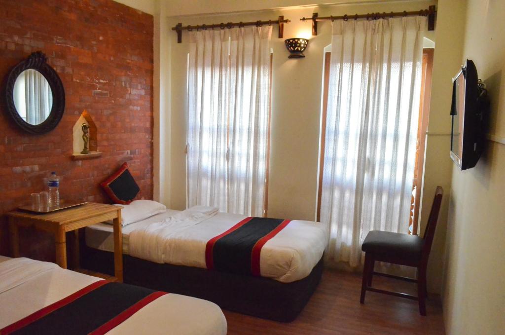 Postel nebo postele na pokoji v ubytování Newa Home