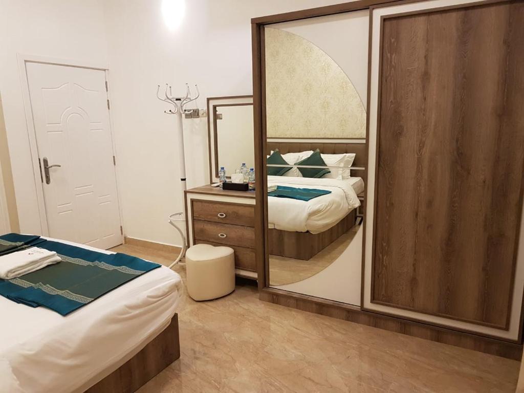 Postel nebo postele na pokoji v ubytování Orient Apartments
