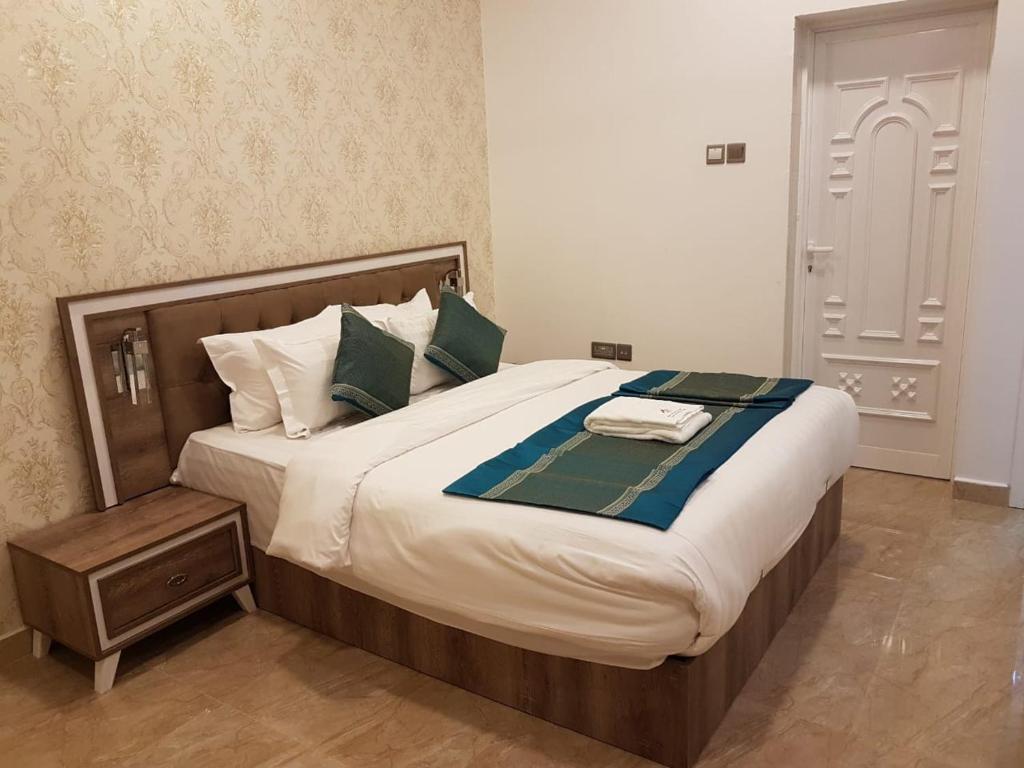 Postel nebo postele na pokoji v ubytování Orient Apartments
