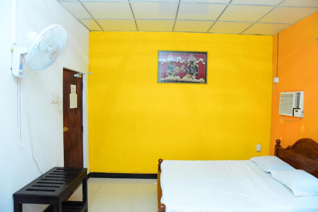 Postel nebo postele na pokoji v ubytování Airport Tourist Hostel