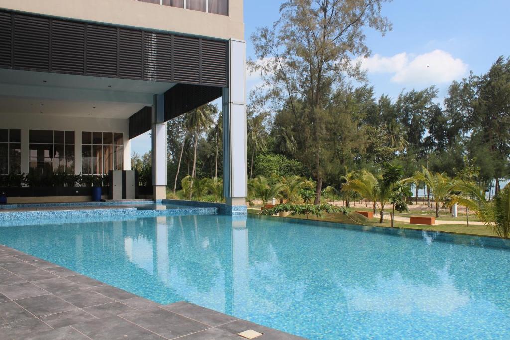 Bazén v ubytování AMERALD RESORT HOTEL DESARU nebo v jeho okolí
