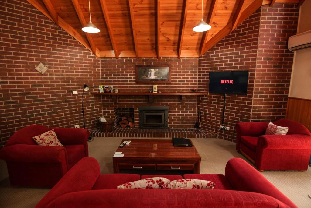 TV a/nebo společenská místnost v ubytování The Lodges