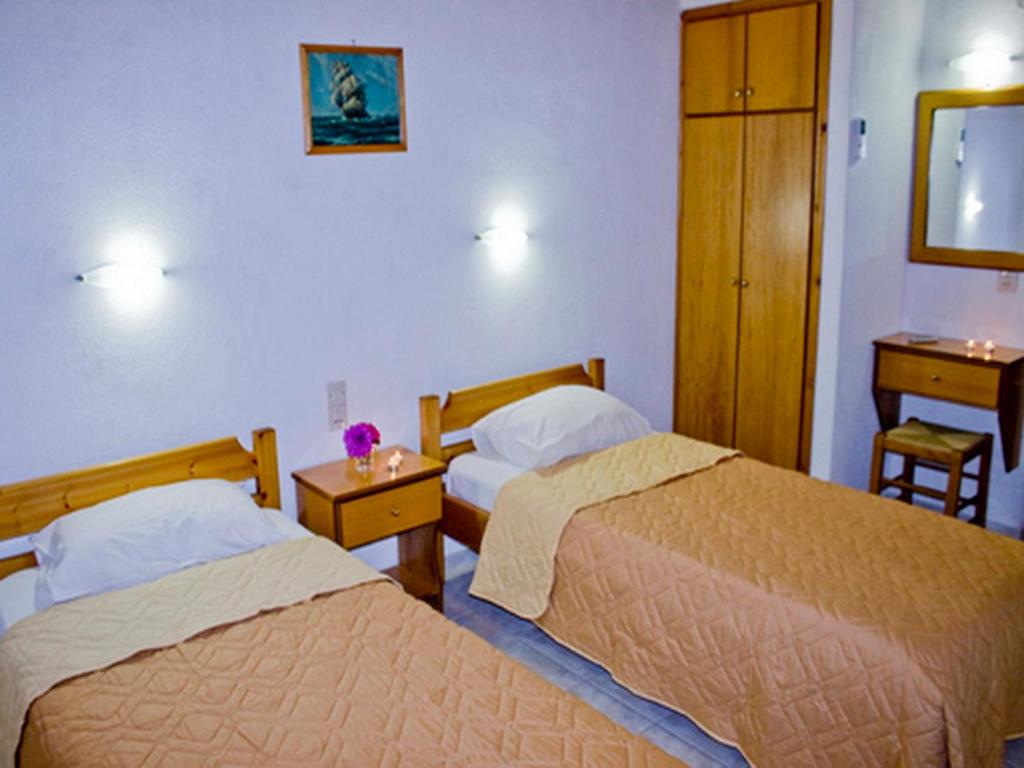 Postel nebo postele na pokoji v ubytování Villa Kavourakia
