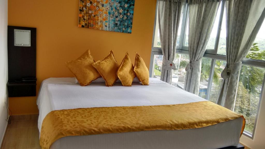 Postel nebo postele na pokoji v ubytování Hotel Anzea