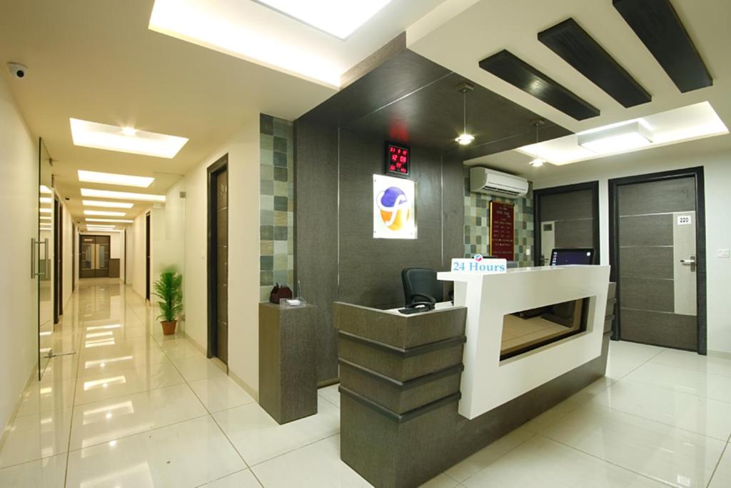 TV a/nebo společenská místnost v ubytování Hotel Flair Inn