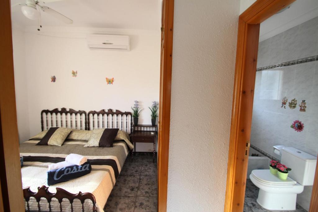 Postel nebo postele na pokoji v ubytování ARENDA Villa Fortuna Miami Playa