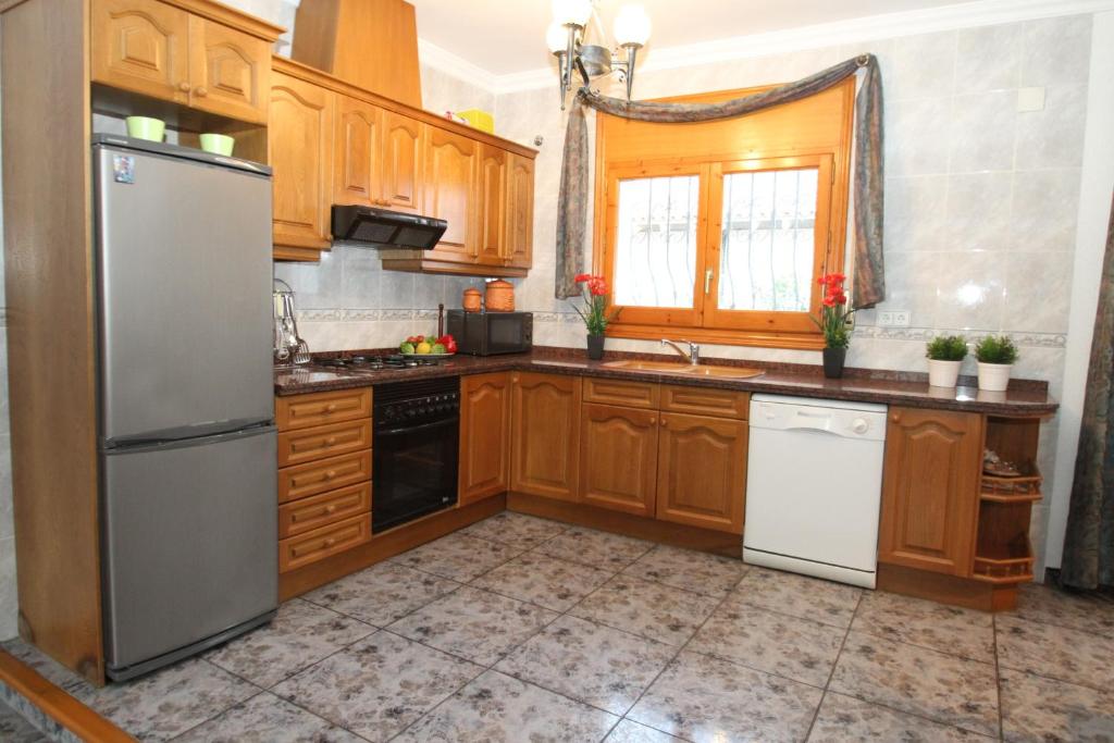 Kuchyň nebo kuchyňský kout v ubytování ARENDA Villa Fortuna Miami Playa