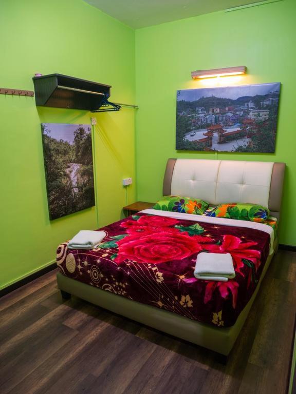 Postel nebo postele na pokoji v ubytování Orchid Haven