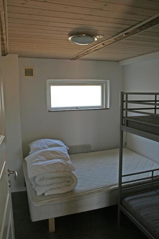 Postel nebo postele na pokoji v ubytování Sorø Camping & Cottages
