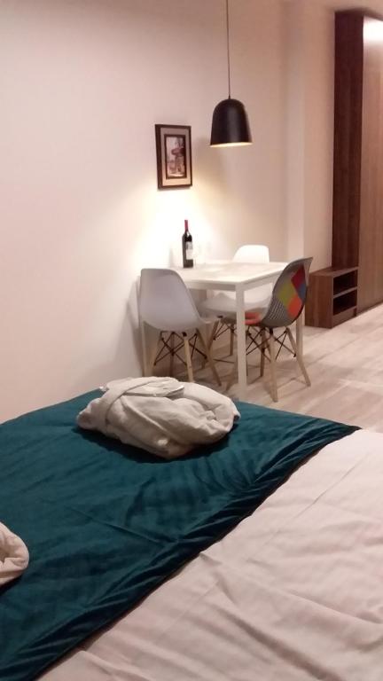 Postel nebo postele na pokoji v ubytování New Gudauri, loft 2, Apartment 309, RED CO