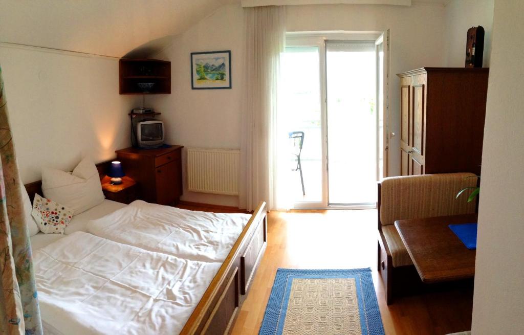 Postel nebo postele na pokoji v ubytování Apartments Urschitz