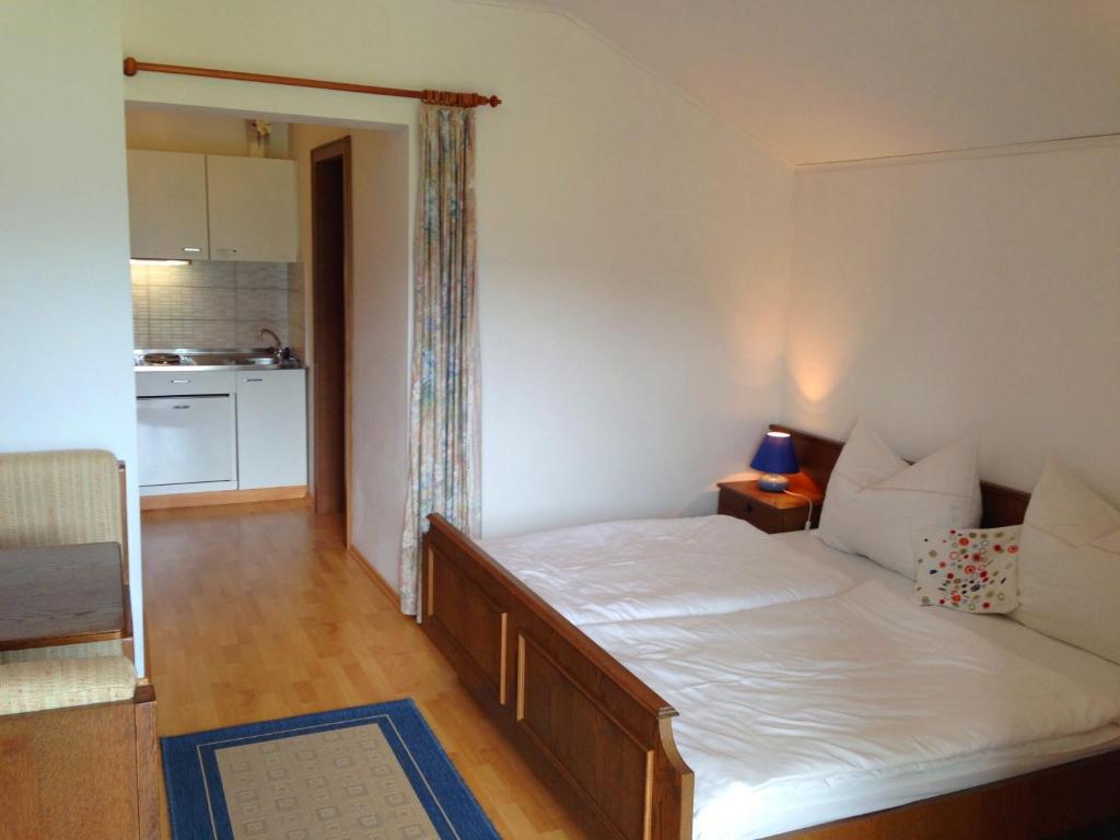 Postel nebo postele na pokoji v ubytování Apartments Urschitz