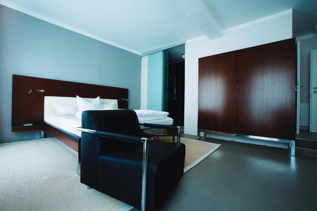 Postel nebo postele na pokoji v ubytování Frühstückshotel im Goldschmiedehaus