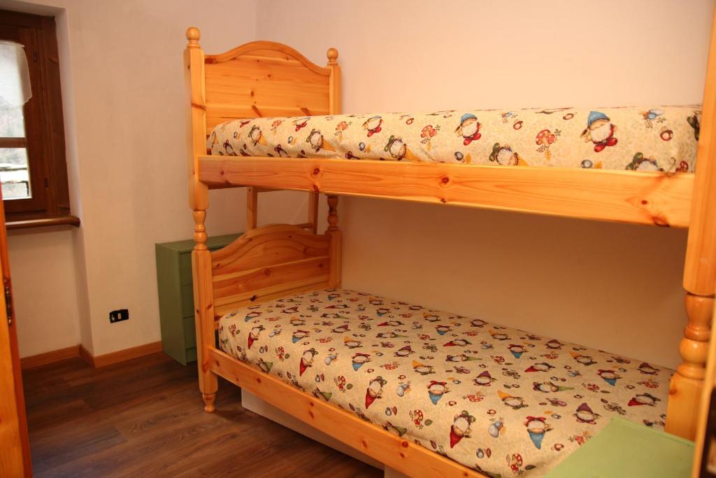 Postel nebo postele na pokoji v ubytování Baite La Pedruscia