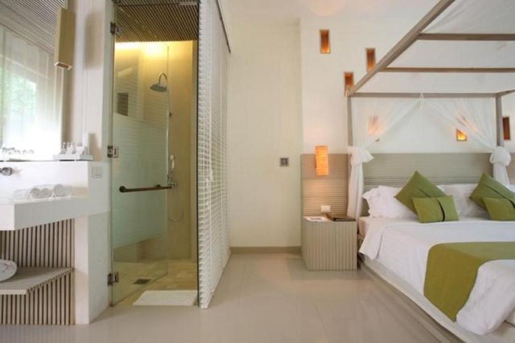 Кровать или кровати в номере Mercure Koh Chang Hideaway