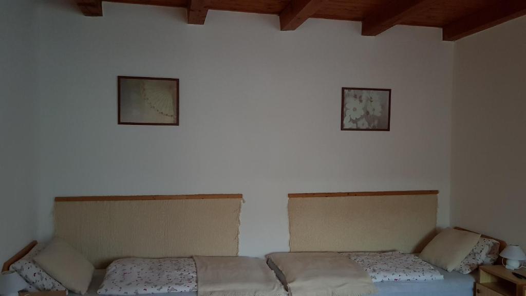 Postel nebo postele na pokoji v ubytování Élő Tisza Vendégház
