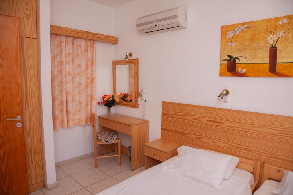 Postel nebo postele na pokoji v ubytování Villa Stamatis
