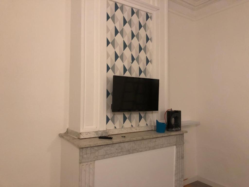 TV a/nebo společenská místnost v ubytování chateau fourclins