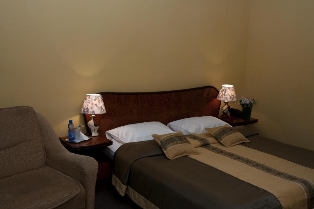 Postel nebo postele na pokoji v ubytování Wien Hotel