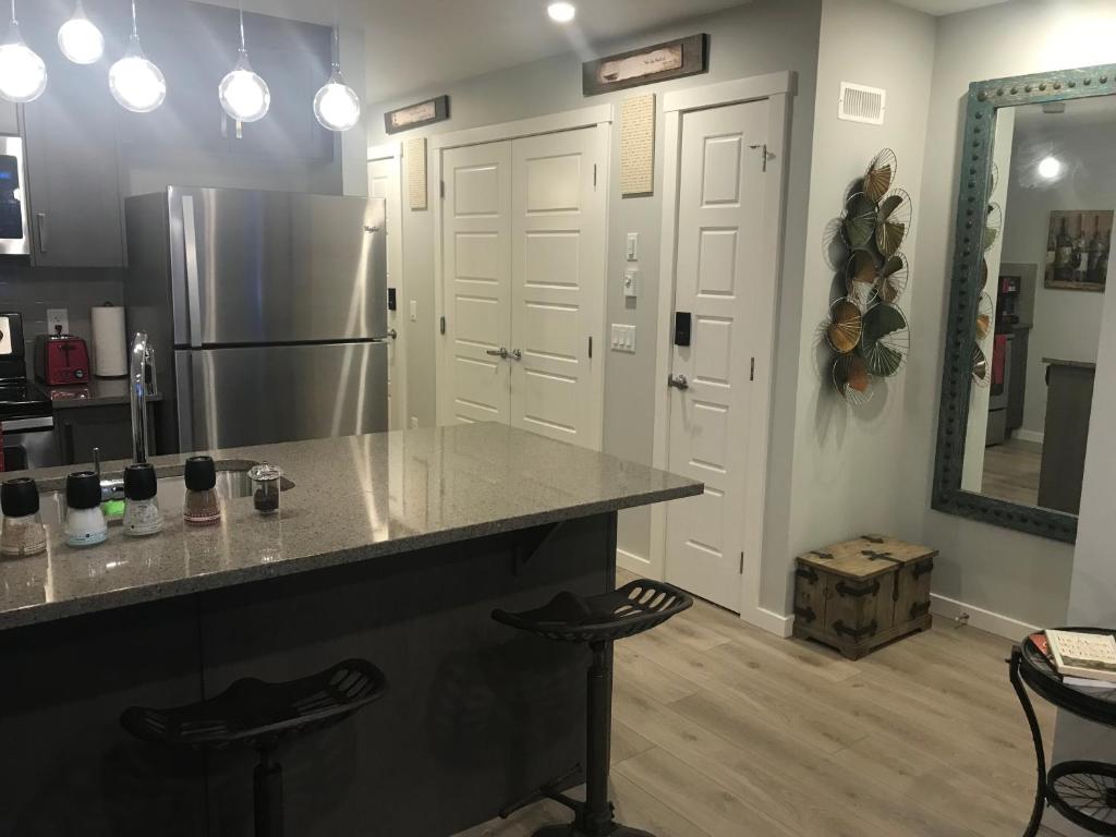 Kuchyň nebo kuchyňský kout v ubytování Home Sweet Condo