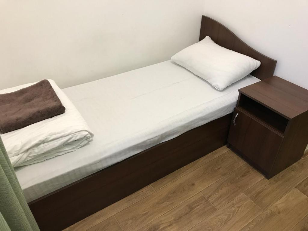 Postel nebo postele na pokoji v ubytování FOX Hostel